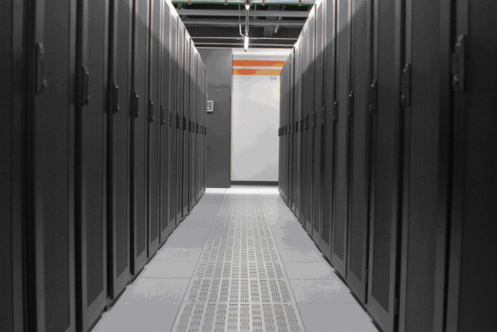 Interior aisle between rows of data center server cabinets