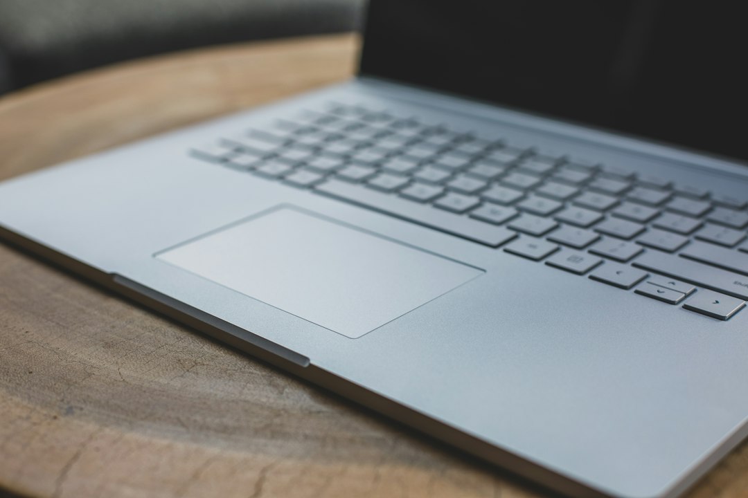 Microsoft Surface laptop and tablet representing Excel Copilot alternatives after the COPILOT function retirement