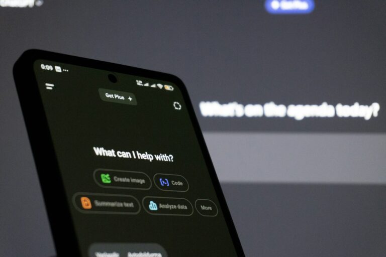 Smartphone displaying an AI assistant interface, representing Gemini 3.8 Live voice AI
