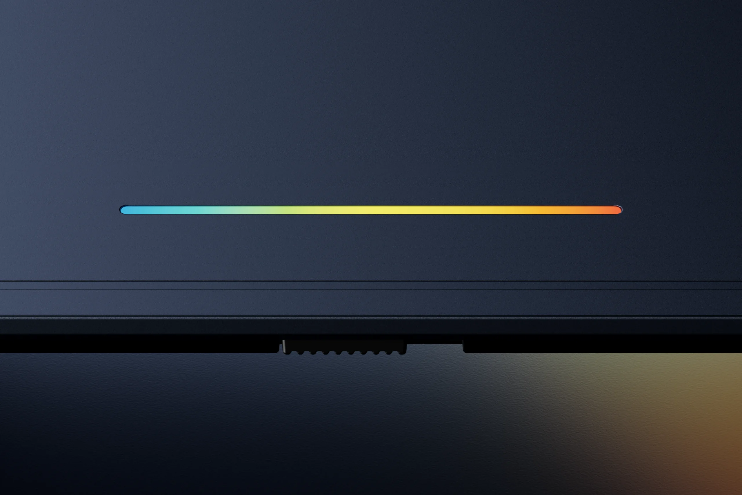Close-up of the illuminated Googlebook Glowbar on the laptop lid