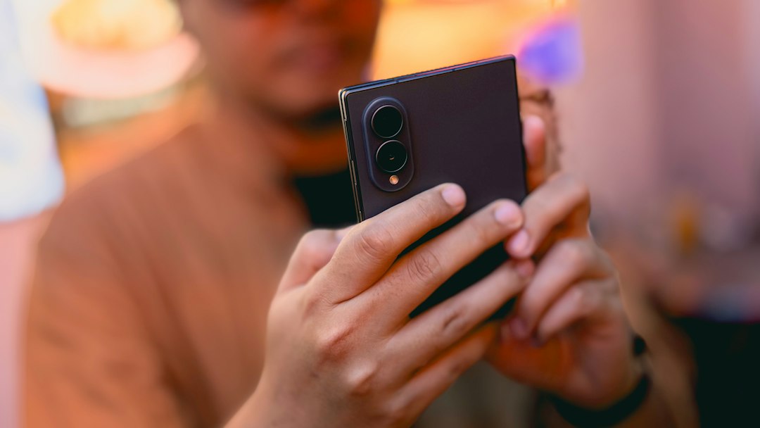 Large foldable smartphone illustrating the dual-screen experience discussed for Apple iPhone Duo