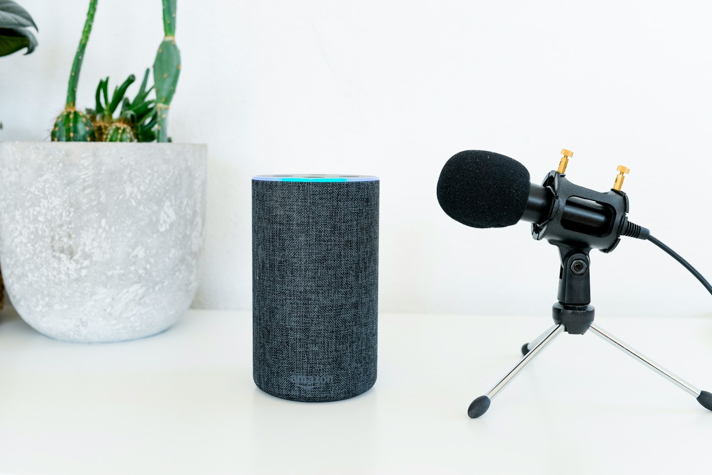 Dynamic microphone beside a smart speaker representing real-time voice AI interactions