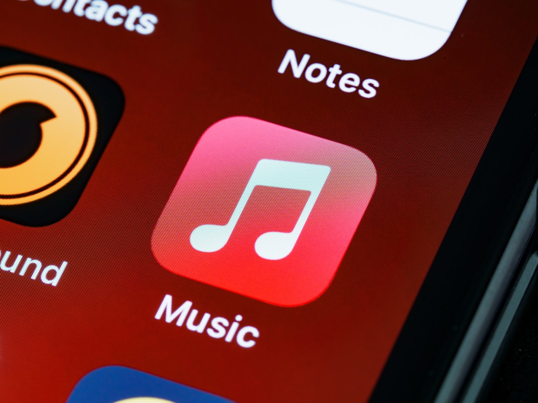 Close-up iPhone home screen representing iOS 27 app and notification settings