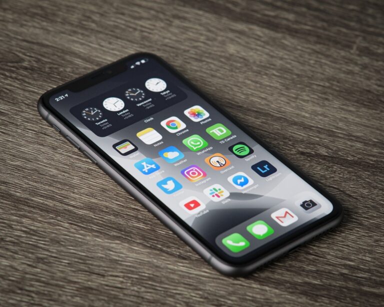 iPhone home screen representing iOS 27 settings users should review after updating