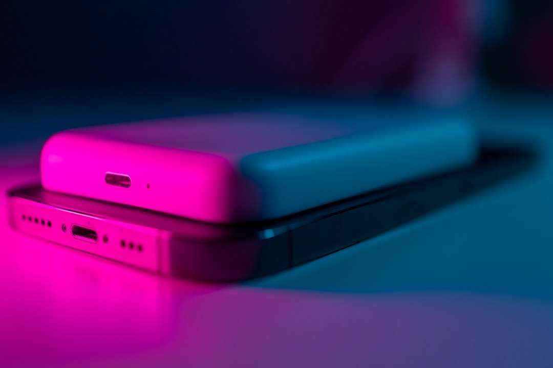 Two smartphones resting on a table