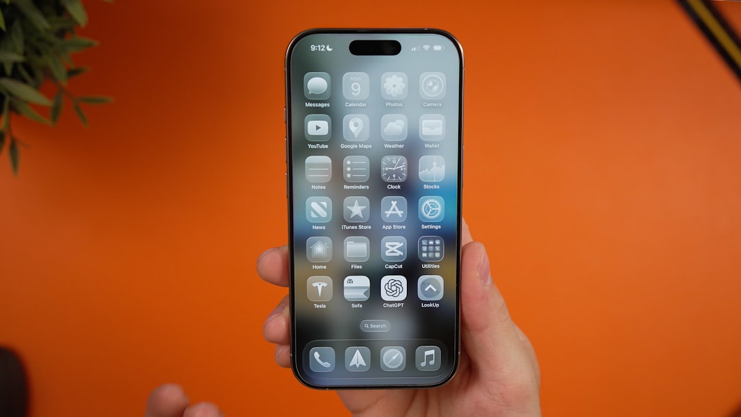 iPhone display showing Apple Liquid Glass interface design used as context for iOS 27 changes