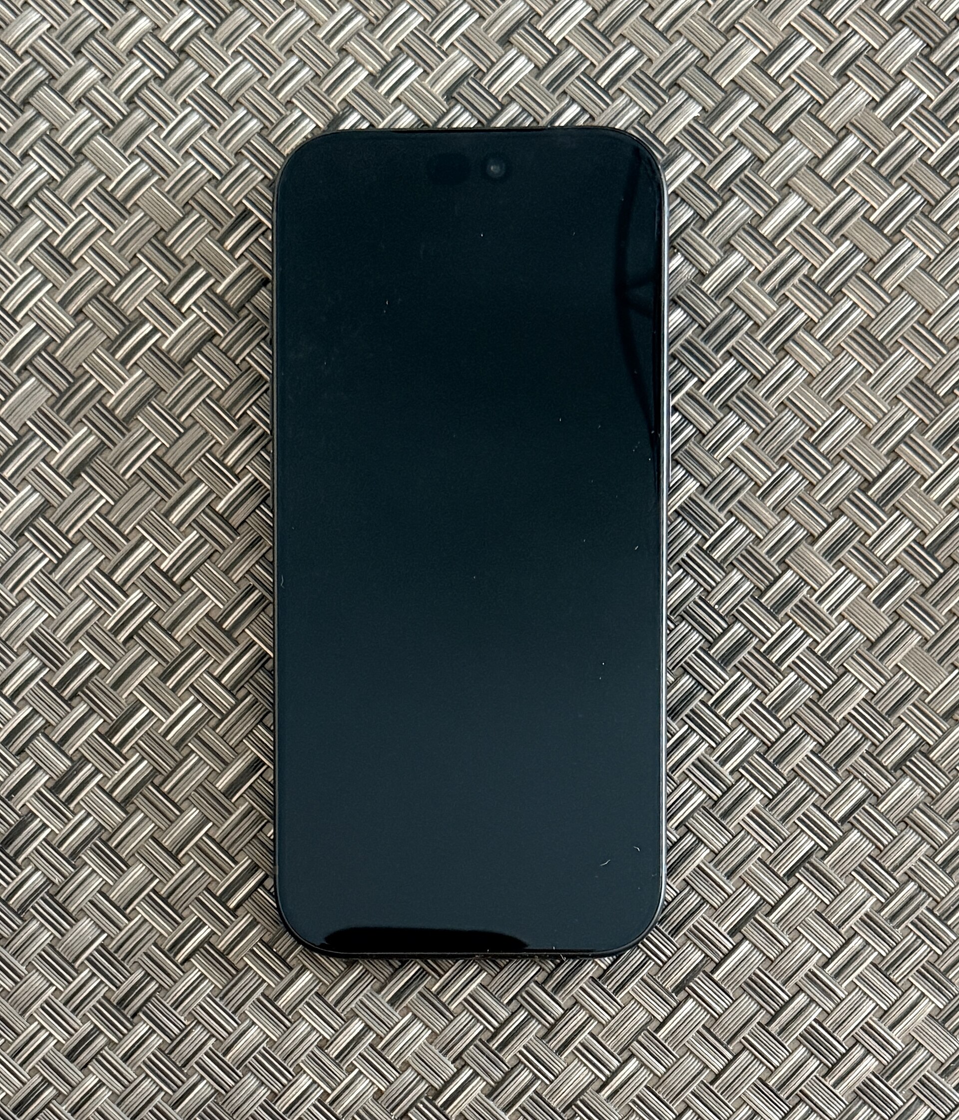 Black iPhone 18 Pro photographed from the front showing its display