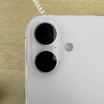 Genuine real-world photograph of an iPhone 16, used as a device reference for screen recording instructions, not a recording test or software screenshot